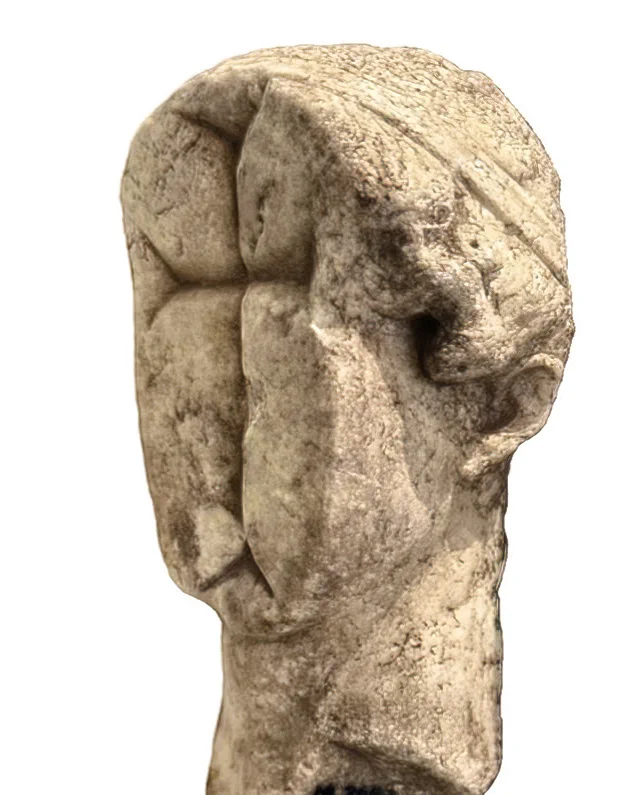 An ancient marble head of a classical goddess, defaced and carved with a Christian cross around the year 500 AD, Archaeological Museum of Samos.