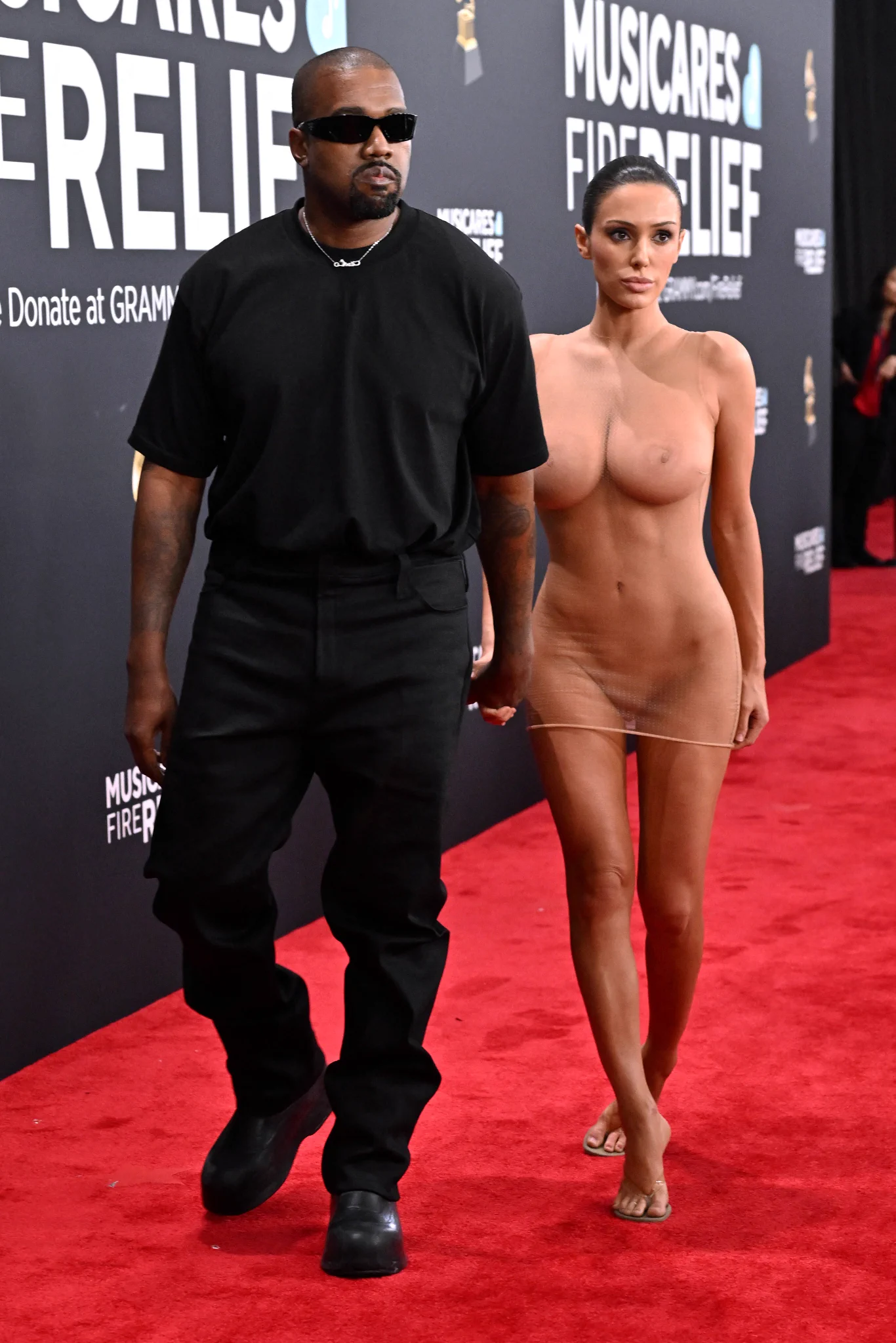 Ye &amp; Bianca arrive at the 67th Annual Grammy Awards 👀👀 https://t.co/kUWGDiv7Rk