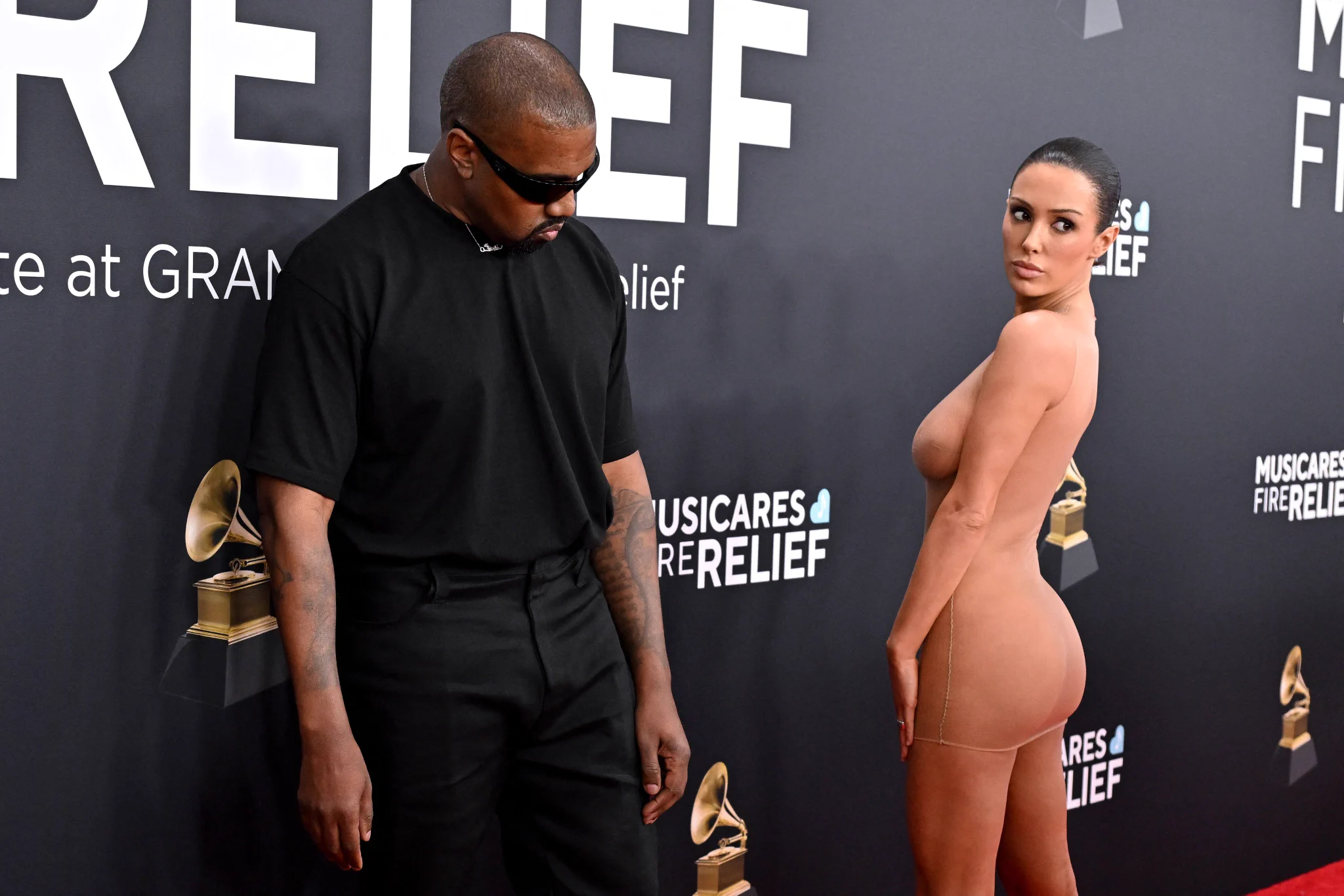 Ye &amp; Bianca arrive at the 67th Annual Grammy Awards 👀👀 https://t.co/kUWGDiv7Rk